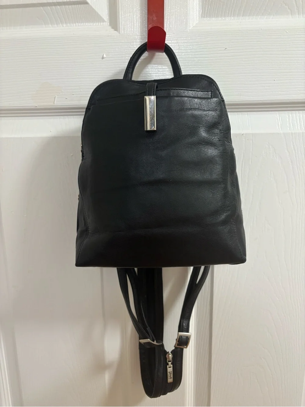 Pelle studios from Wilson leather back pack /organizer. Measures 9 by 9 by 3”
